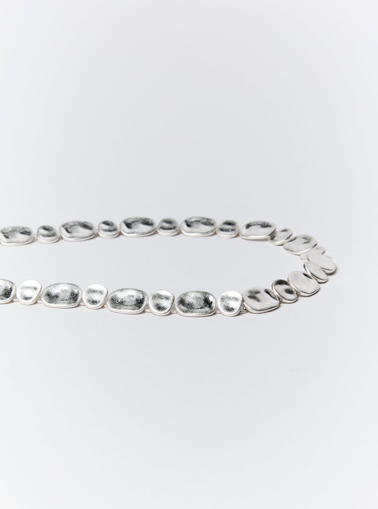 IRREGULAR DISC NECKLACE